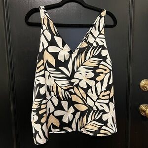 Sleeveless, floral top in neutral tones